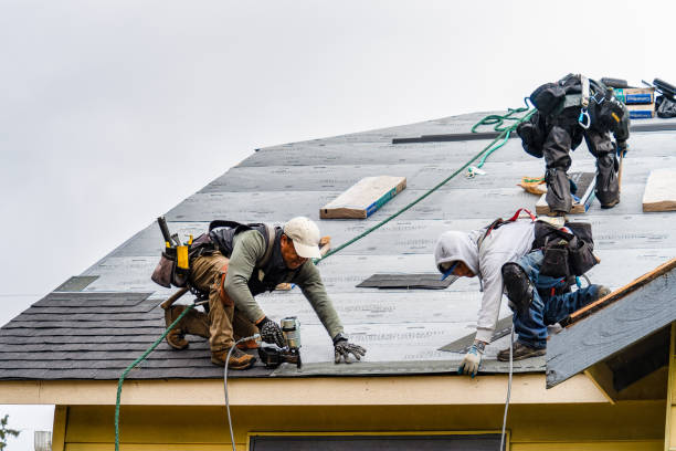 Professional Gutter Installation technician working in Marcola, OR